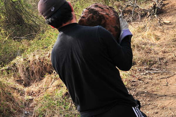 A heavy rock marks the corner