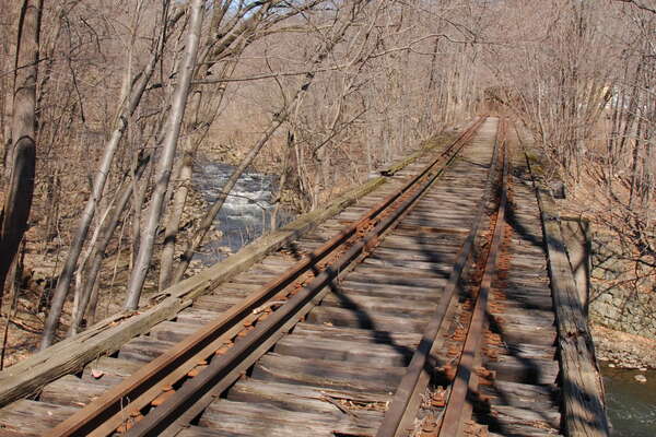 Old railroad bridge on southern side of park