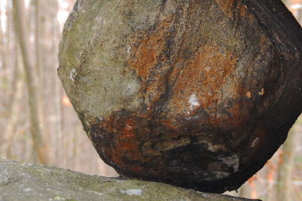 The smallest of three boulders Tripod Rock